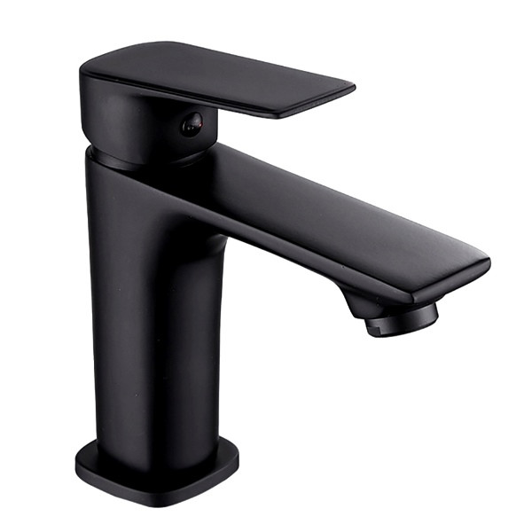 تصویر نصبشده شیر روشویی آبشاری روی سینک سنگی سفید در سرویس بهداشتی لوکس.